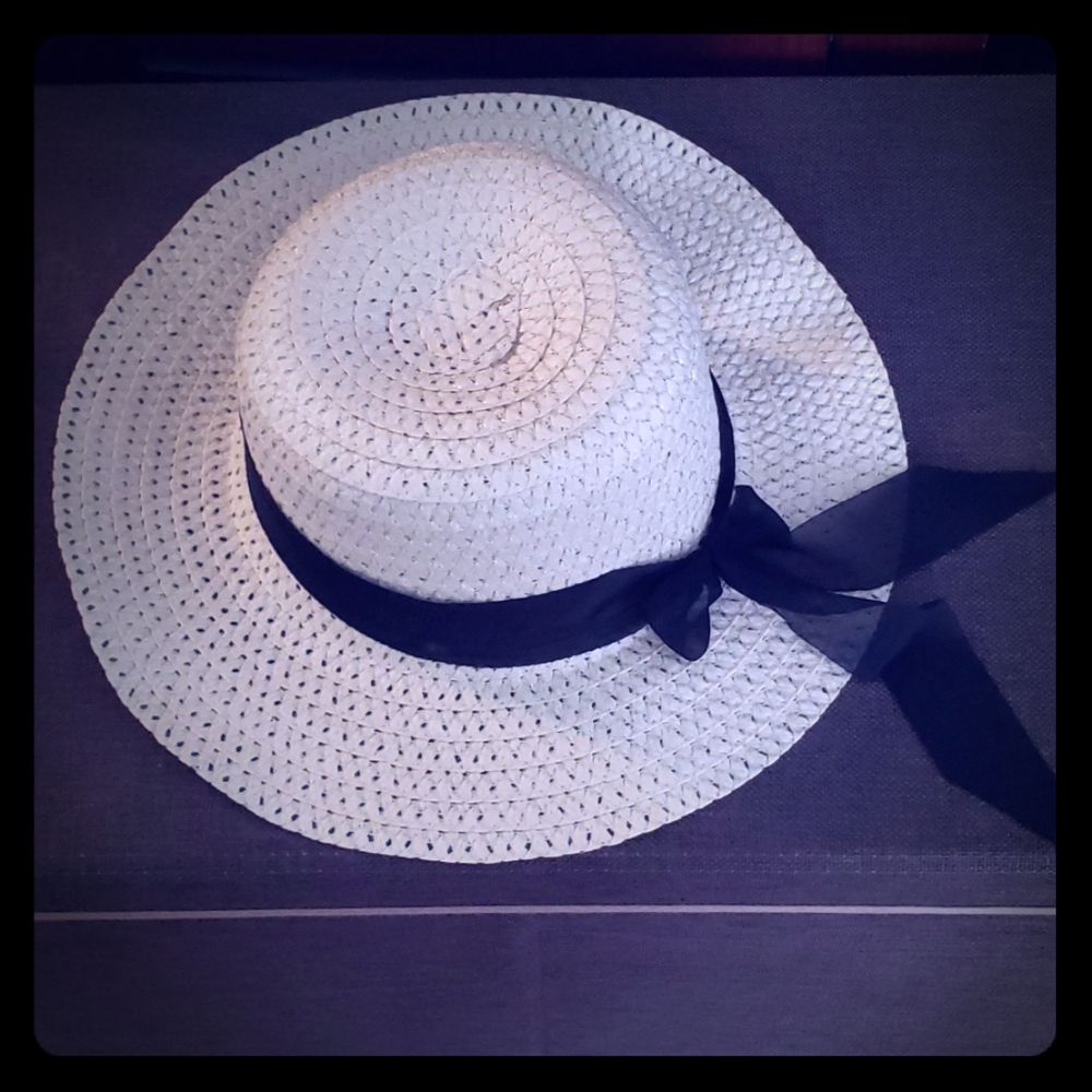 Hat with black ribbon